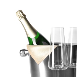 Photo of Empty glasses and metal bucket with bottle of champagne on white background