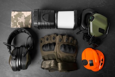 Photo of Different military training equipment on black background, flat lay