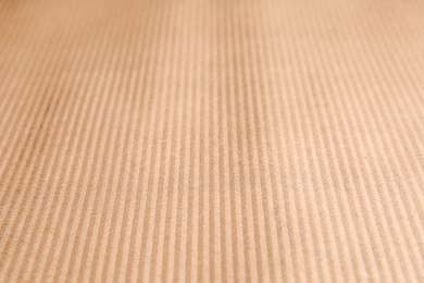 Photo of Brown corrugated sheet of cardboard as background, closeup