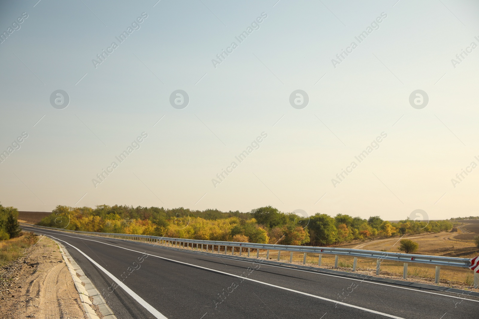 Photo of Beautiful view of empty asphalt highway. Road trip