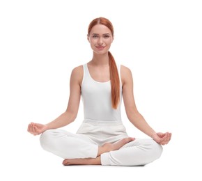Beautiful young woman practicing yoga on white background. Lotus pose