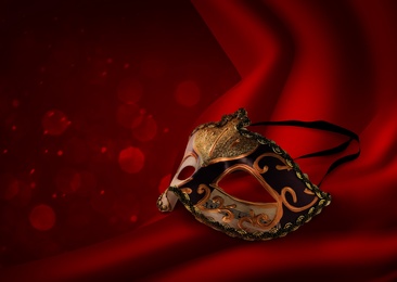 Image of Beautiful carnival mask on red front curtain