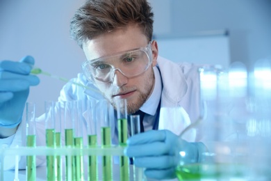 Male scientist working with sample in chemistry laboratory