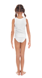 Little girl in underwear on white background, back view