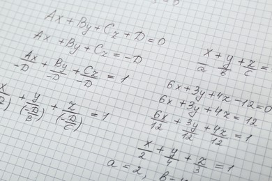 Sheet of paper with different mathematical formulas, closeup