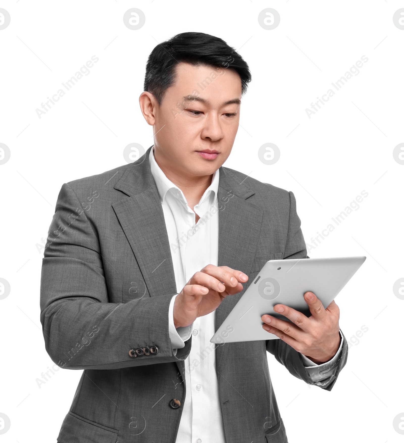 Photo of Businessman in suit using tablet on white background