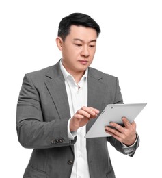 Businessman in suit using tablet on white background