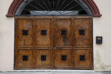 Photo of Exterior of building with beautiful wooden gates