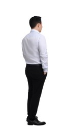 Businessman in formal clothes posing on white background