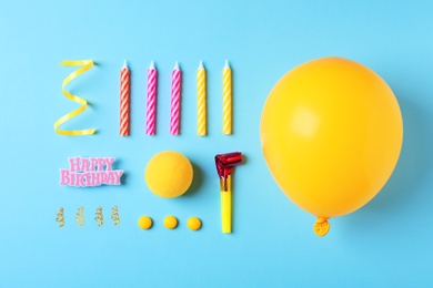 Photo of Flat lay composition with birthday party items on color background