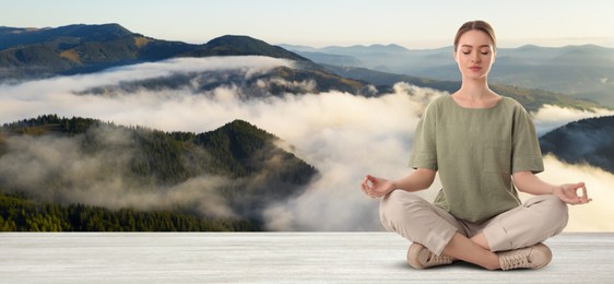 Image of Young woman practicing yoga on white wooden surface against beautiful mountain landscape, space for text. Banner design