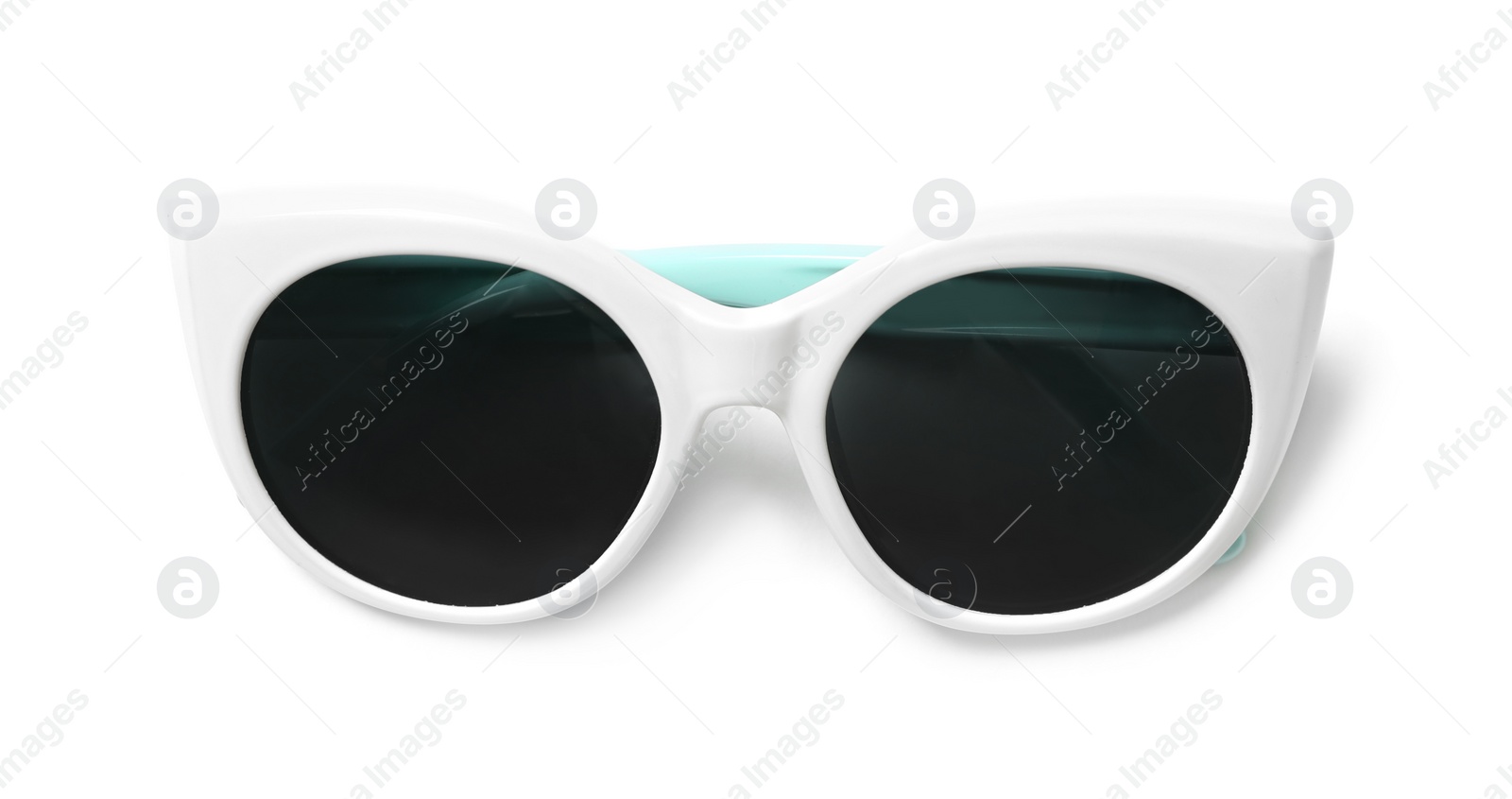 Photo of New elegant women's sunglasses isolated on white
