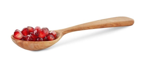 Photo of Ripe juicy pomegranate grains in wooden spoon isolated on white