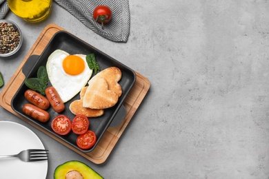 Photo of Romantic breakfast on grey table, flat lay with space for text. Valentine's day celebration