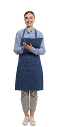 Photo of Beautiful young woman in clean denim apron with clipboard on white background