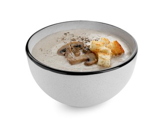 Photo of Delicious cream soup with mushrooms and croutons on white background