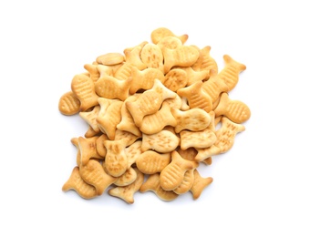 Photo of Delicious crispy goldfish crackers on white background, top view