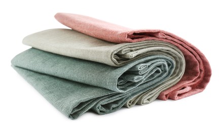 Photo of Rolled clean kitchen towels isolated on white