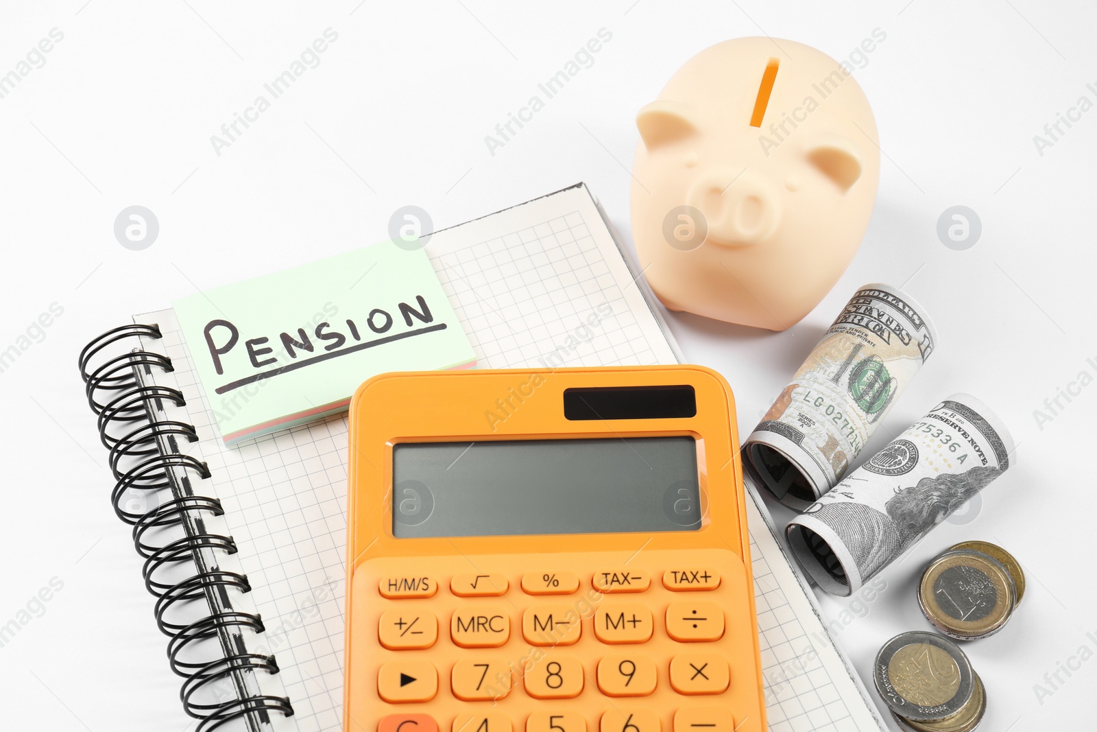 Photo of Calculator, piggy bank and money on white background. Pension concept