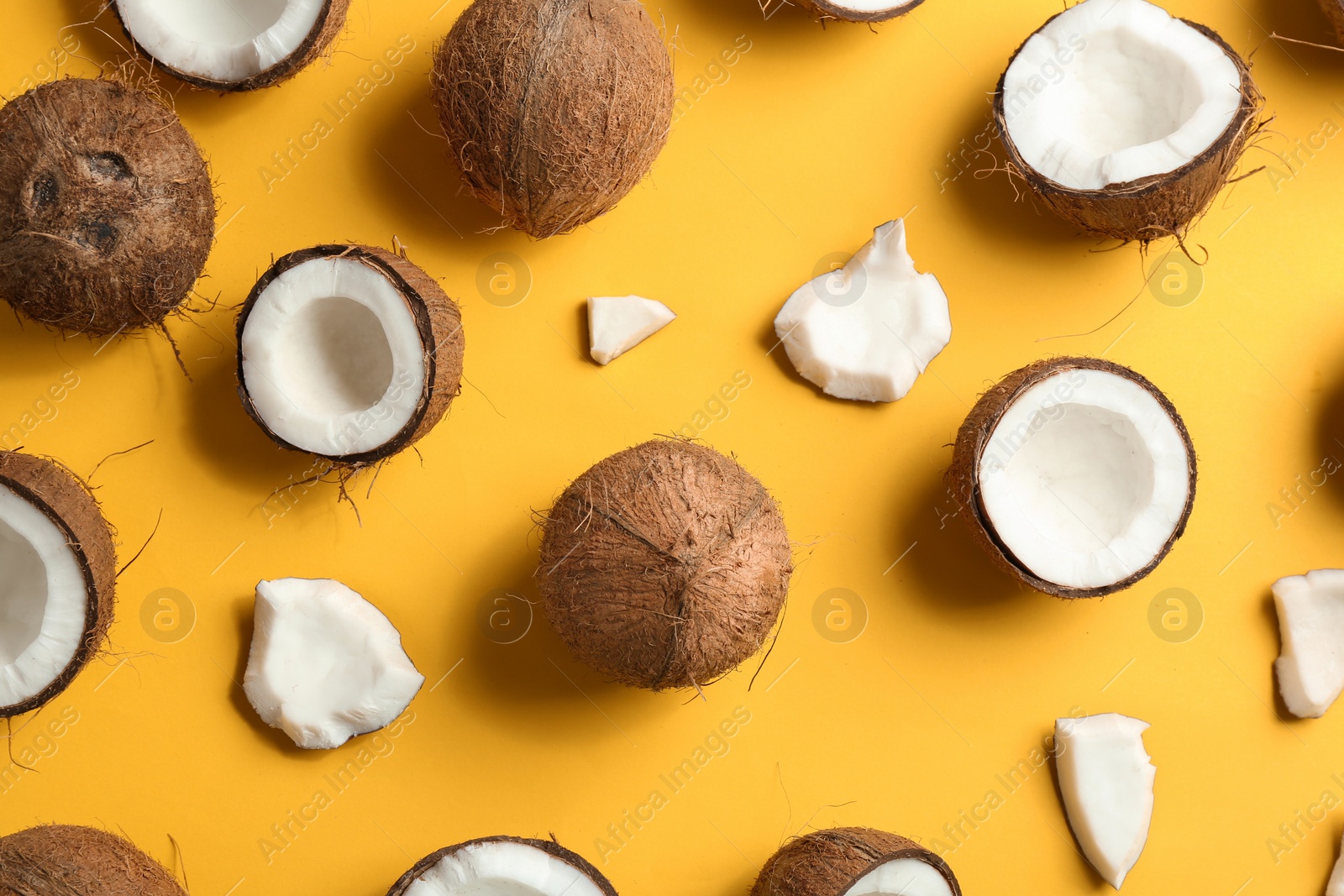 Photo of Coconut pattern on color background, flat lay