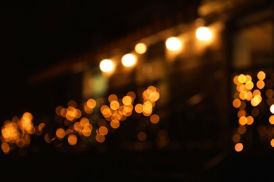 Photo of Beautiful street lights at night. Bokeh effect