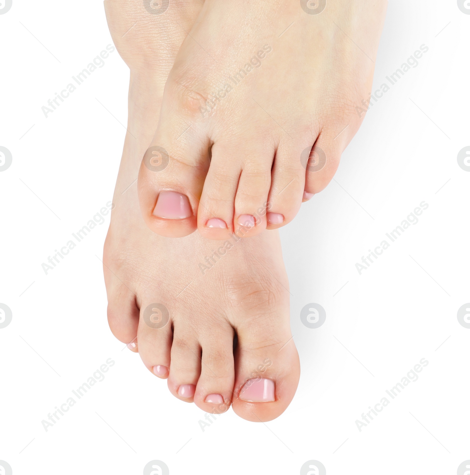 Photo of Woman with neat toenails after pedicure procedure isolated on white, closeup