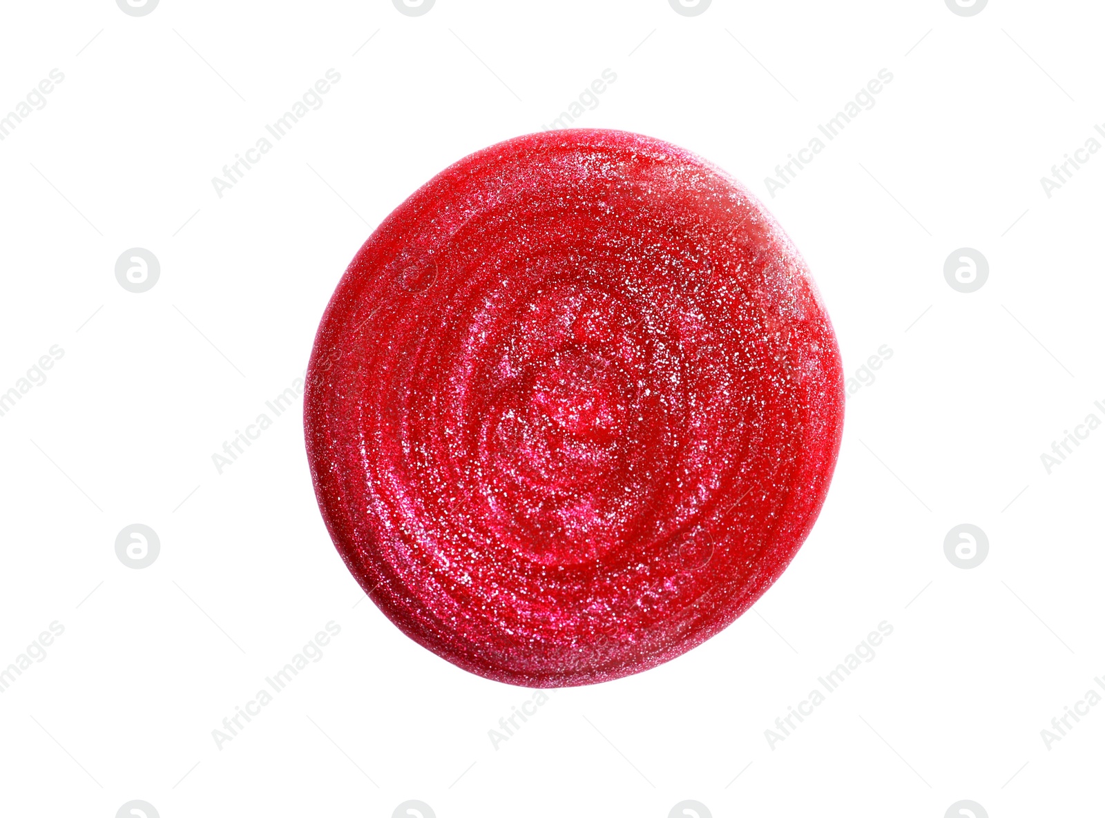 Photo of Spilled bright nail polish with glitter on white background, top view