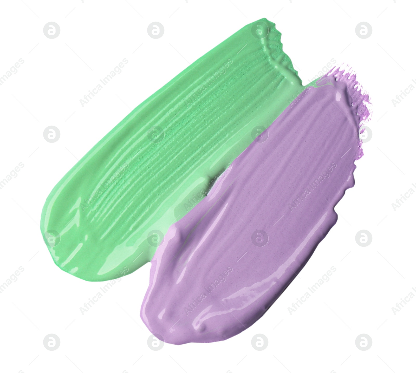 Photo of Strokes of different color correcting concealers isolated on white