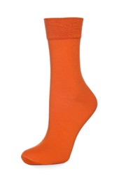 Photo of Orange sock isolated on white. Footwear accessory