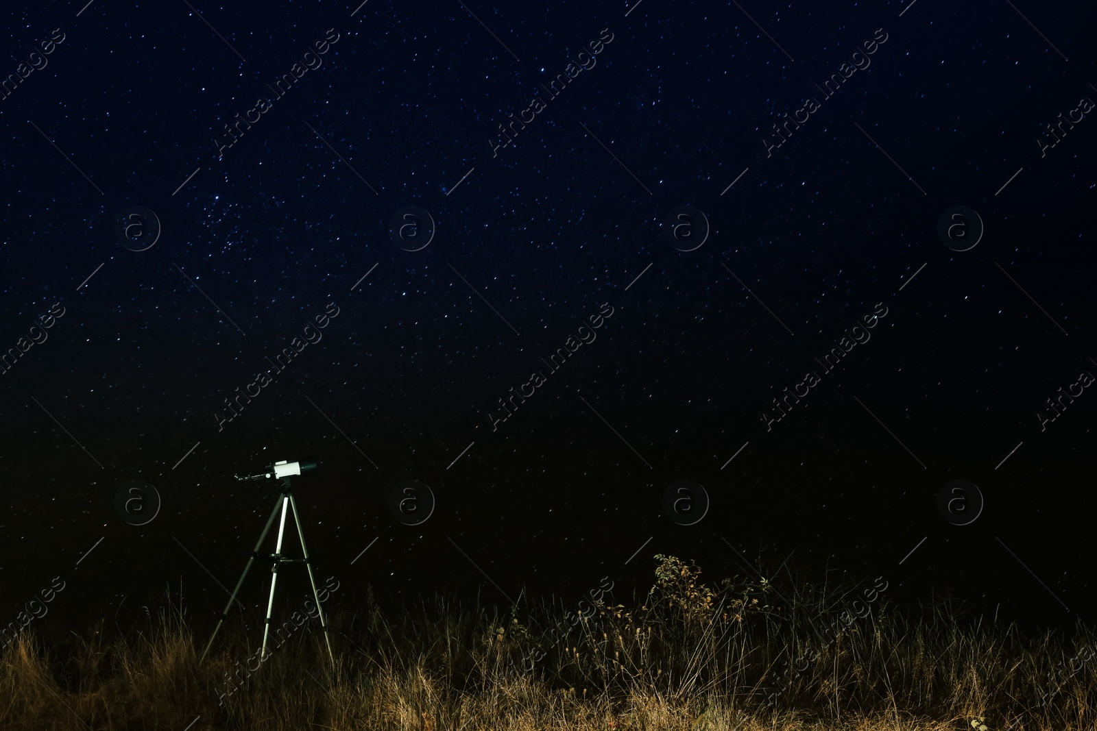 Photo of Modern telescope and beautiful sky in night outdoors. Learning astronomy