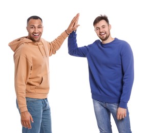 Photo of Men giving high five on white background
