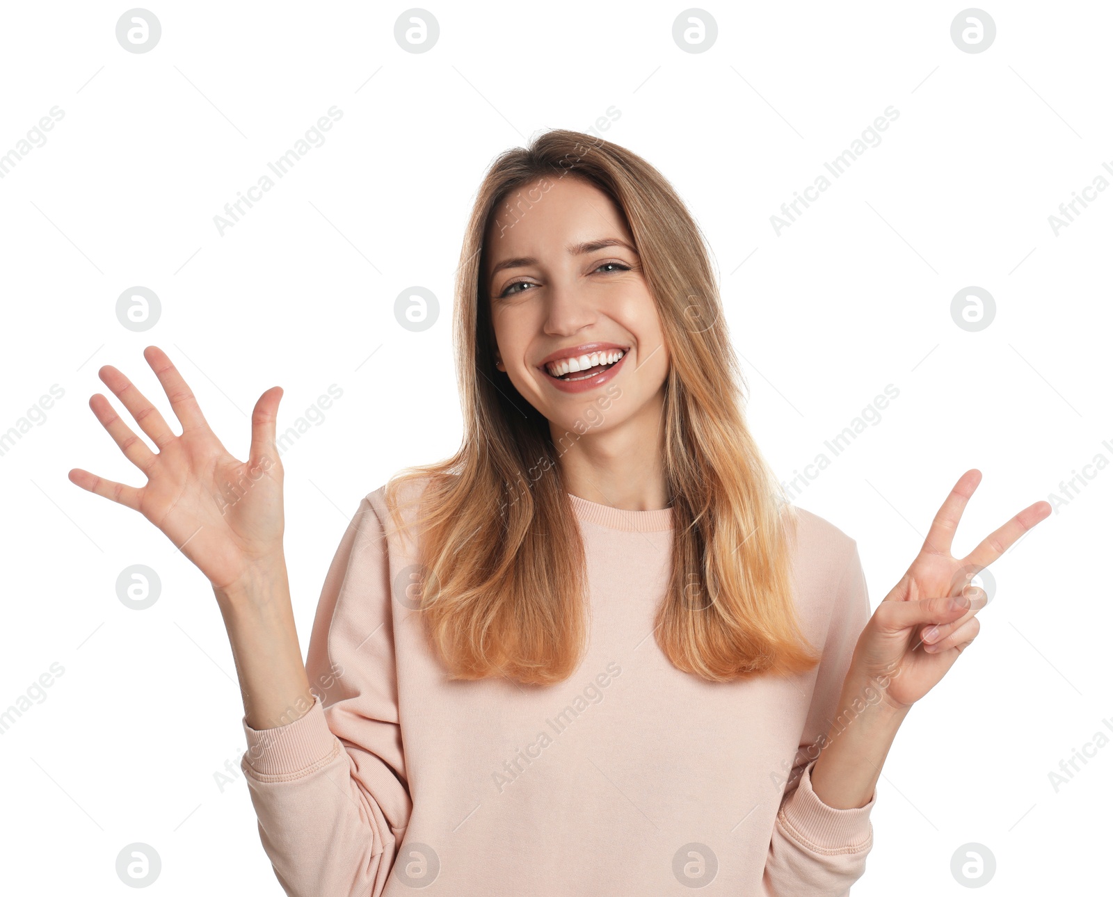 Photo of Woman showing number seven with her hands on white background