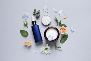 Photo of Flat lay composition with cosmetic serum on light grey background