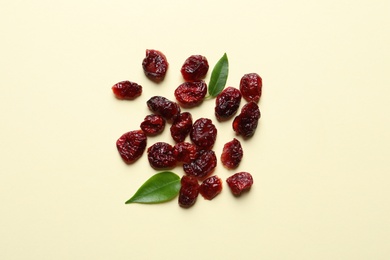 Cranberries on color background, top view. Dried fruit as healthy snack