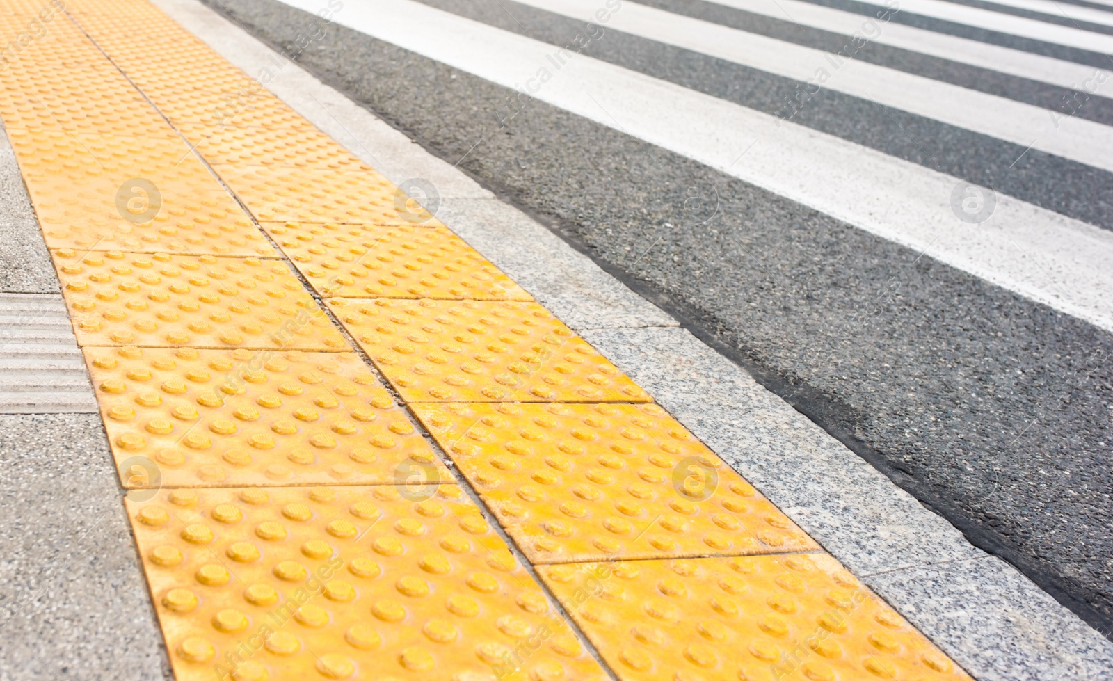 Photo of Tiles with tactile ground surface indicators, closeup view