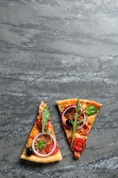 Photo of Flat lay composition with slices of tasty homemade pizza and space for text on table