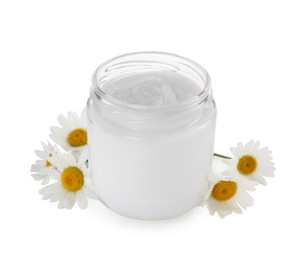 Jar of hand cream and chamomiles on white background