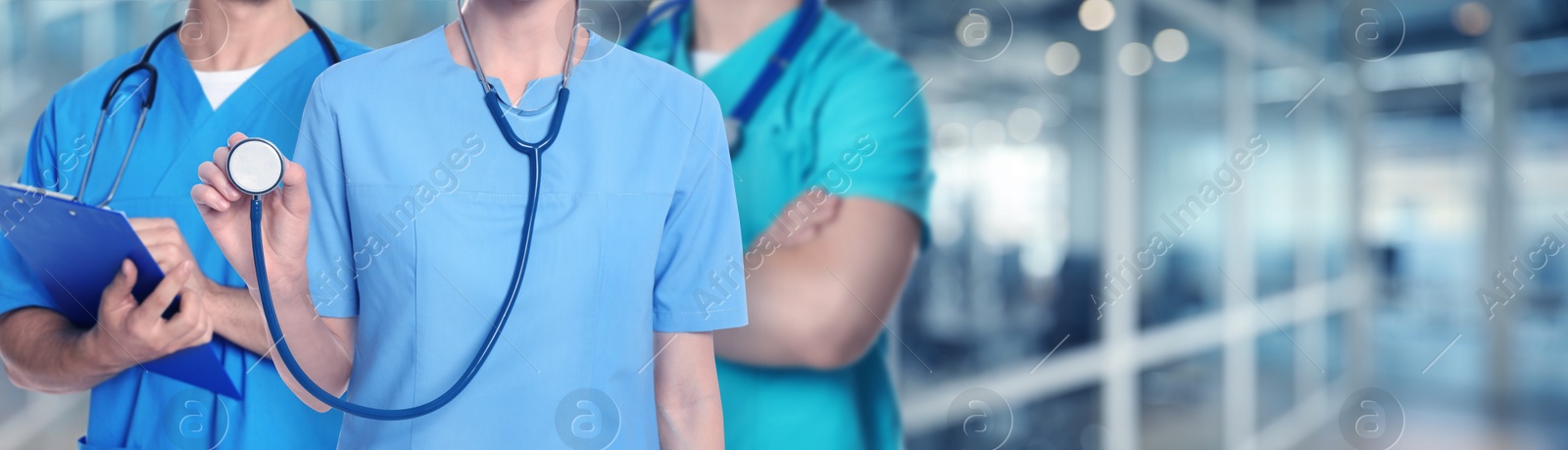 Image of Doctors and nurse in hospital, closeup. Banner design with space for text