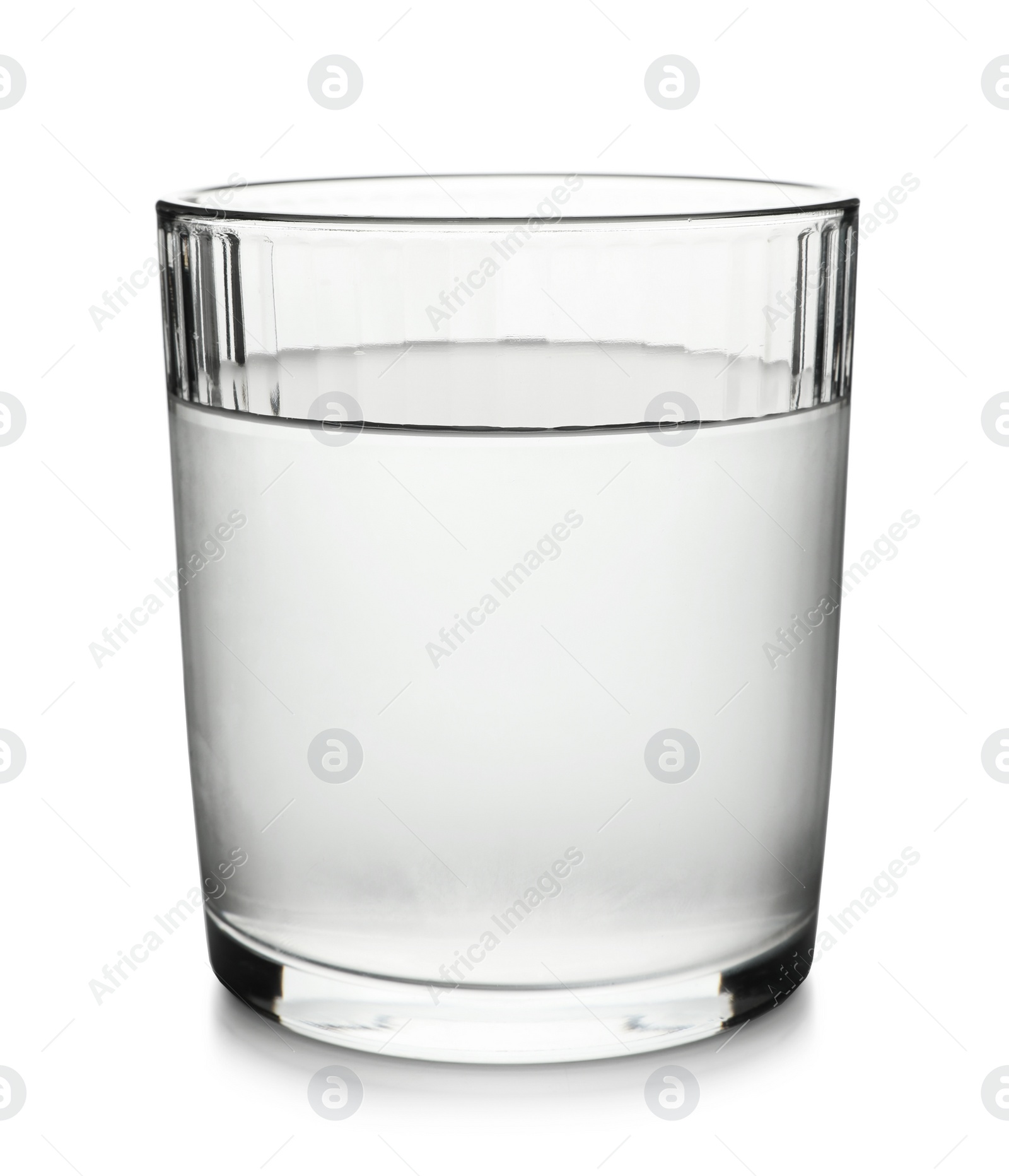 Photo of Glass of cold clear water on white background. Refreshing drink