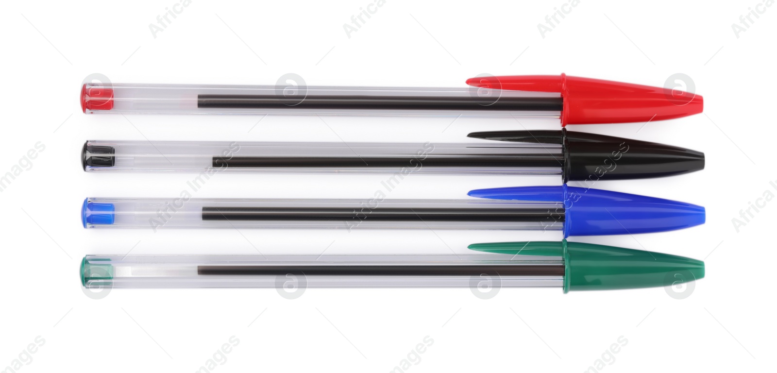 Photo of New color plastic pens isolated on white, top view