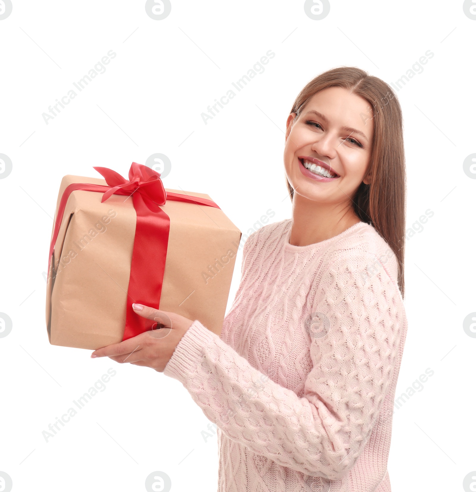 Photo of Happy young woman with Christmas gift on white background