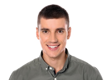 Photo of Portrait of handsome young man on white background