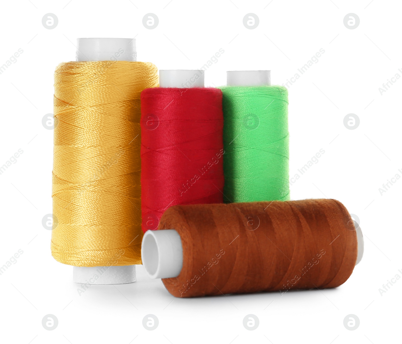 Photo of Set of color sewing threads isolated on white