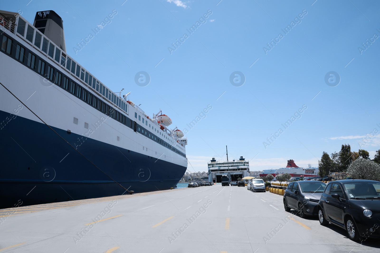 Photo of Modern ferry in sea port on sunny day