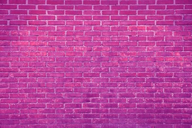 Image of Texture of bright pink brick wall as background