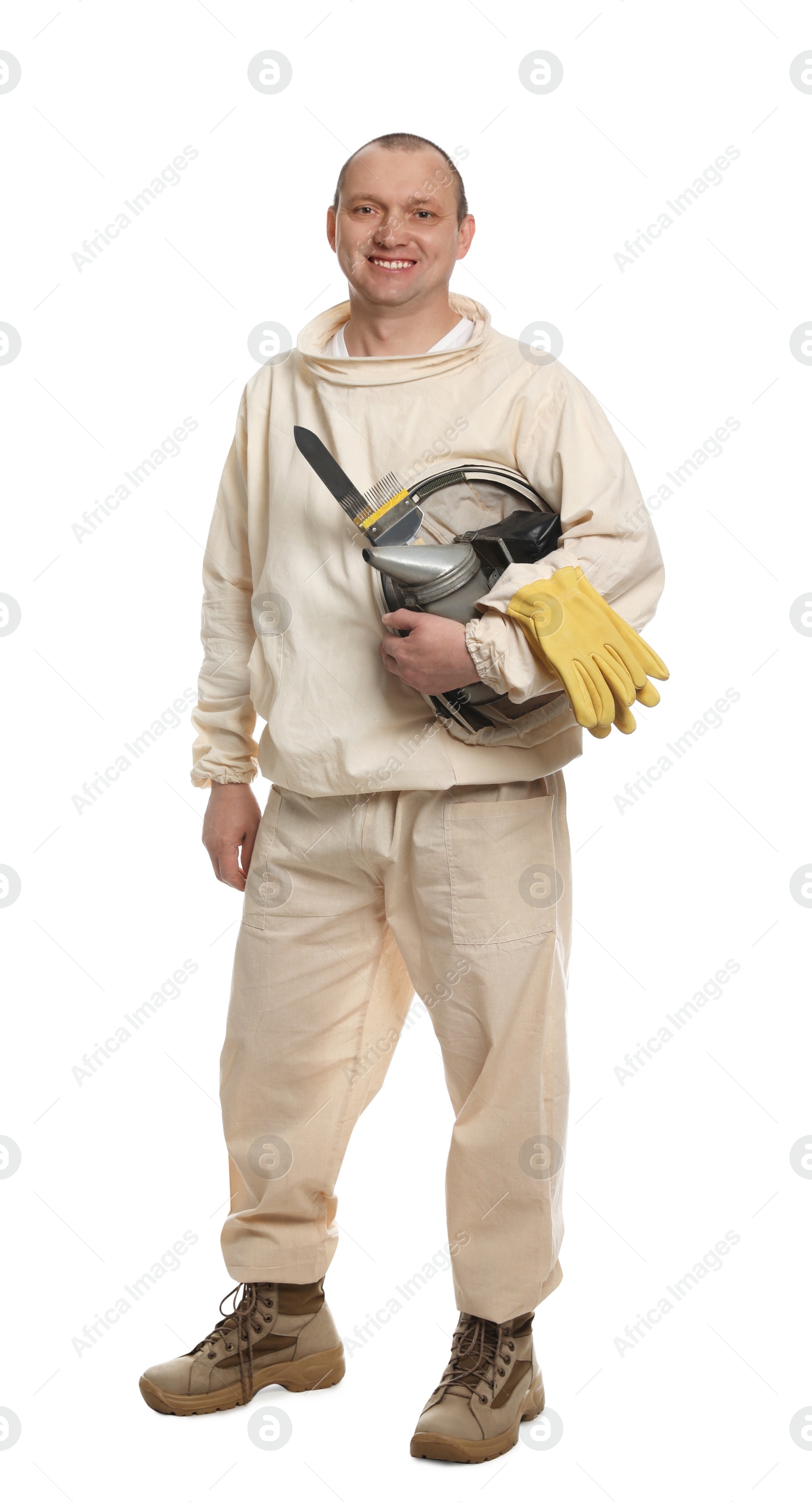 Photo of Beekeeper in uniform with tools on white background