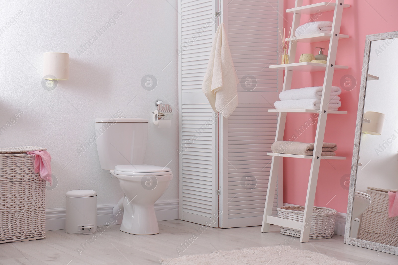 Photo of Toilet bowl in modern bathroom interior