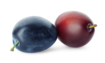 Delicious fresh ripe plums on white background