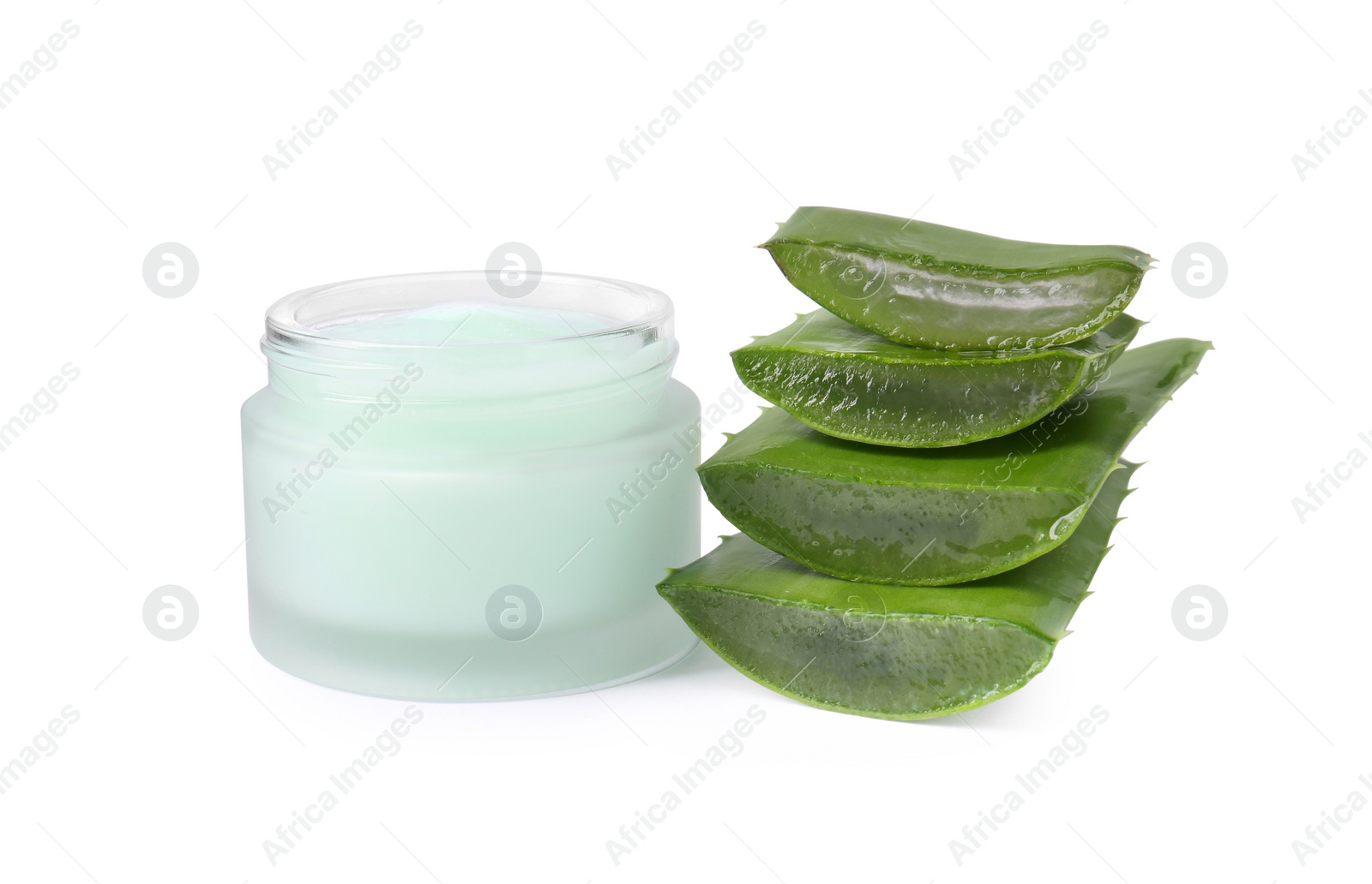 Photo of Jar of natural gel and cut aloe isolated on white