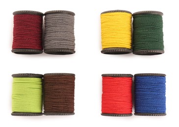 Photo of Set of colorful sewing threads on white background, top view